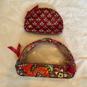2 Vera Bradley travel cases.
